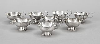 Eight brandy bowls/cups, Sweden, mid-20th century, different makers, silver 830/000, round stand, hemispherical bowl with handle attached to the side,