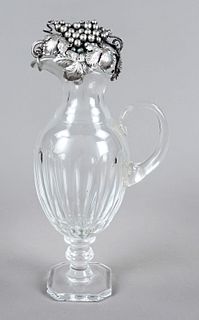 Giving jug with attached silver lid, 20th c., silver tested, lid in shape of grapes and leaves, open worked, jug on square plinth, baluster stem, ovoi