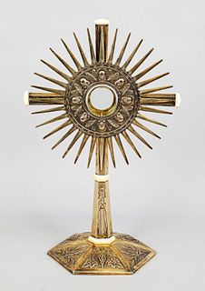 Large monstrance, Netherlands, 1920s, silver 833/000, predominantly gilded, hexagonal domed stand, with floral relief decoration, angular tapering sha