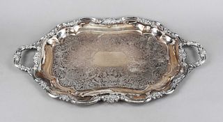 Large serving tray, 20th c., plated, matching curved form. side set handles, floral relief decoration rim, mirror with ornamental engraved decoration,