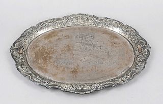 Oval tray, German, c. 1900, maker's mark Gebr. Glaser, Hanau, silver 800/000, matching curved rim, rich relief decoration, floral motifs and figural s