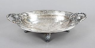Oval Art Nouveau bowl, c. 1900, marked Carl Rusch, Kgl. Hof-Juwelier Hannover, silver tested, on 4 feet, lateral set decorated handles, wall with reli