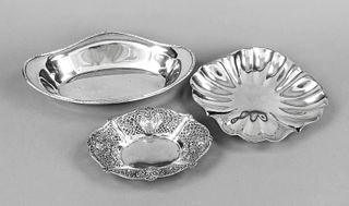 Three bowls, 20th c., different makers, silver 800/000, different shapes and sizes, 1x open worked, l. to 30 cm, Ø 24 cm, total wt. ca. 700 g
