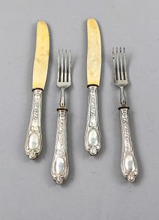 Dessert cutlery for six persons, around 1900, silver 800/000, filled handles with ornamental decor, 12 forks and knives each, l. 17 and 19,5 cm respec
