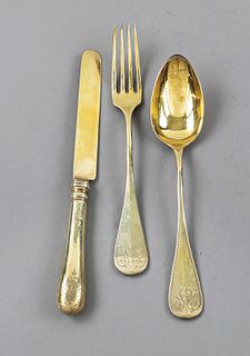 Dinner set, around 1900, silver 800/000, gilded, rounded handles with engraved decoration and monogram, 5 forks and knives and 4 spoons each, l. to 20