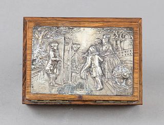 Rectangular wooden lidded jar with silver relief in the lid, German, silver 800/000, with figural scene, smooth shape, hinged hinged lid, l. 15 cm