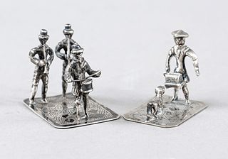 Two miniatures, early 20th c., silver hallmarked, group of 3 musicians and man with hurdy-gurdy and dog, each on rectangular plinth, l. to 4 cm, total