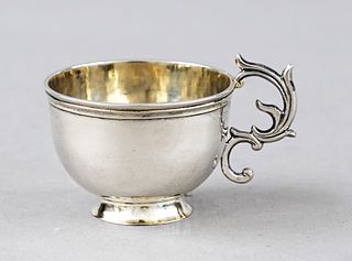 Charka/vodka cup, probably Russia, 18th century, silver tested, gilding inside, on round stand ring, cup with profiled rim, decorated handle attached 