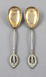 Pair of cream spoons, German, around 1900, jeweler's mark Merklein, silver 800/000, gilded spoon, handle finial in the shape of a standing putto with 