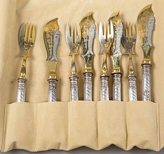Fish cutlery for four persons, around 1900, silver tested, partial gilding, filled pistol handles with rich relief decoration, floral and ornamental m