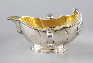 Gravy boat, end of 18th century, silver hallmarked, tremolo line, gilded interior, matching curved oval stand, shell-shaped body with side-mounted dec