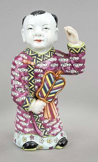 Porcelain boy, China, Republic period (1912-1949), porcelain with polychrome enamel painting, cheerful looking child servant (probably Sudhana-Kumara)