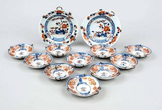 12 Imari bowls, Japan, 18th century, Imari porcelain with polychrome glaze painting of floral decoration, all with wall hanging, partly bumped, d 10-1