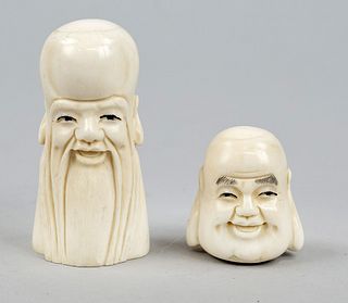 Two sly heads, China or Japan, 20th c., engraved bone carvings, head of Budai and Shouxing, h 5cm/8cm