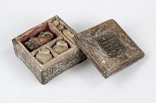 Seal box, China, around 1900, carved and uncarved seal pads in a fanned seal box with relief decoration, 8x8cm