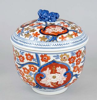 Large Imari lidded box, Japan, 20th c., porcelain with hand-painted polychrome glaze decoration and gold paint, rain of plum blossoms and peony cartou