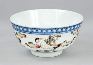 Guangxu style tea bowl, China, 20th c., porcelain with polychrome glaze painting of cranes over the sea waves between colorful clouds, apocryphal six-