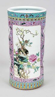 Umbrella stand famille rose, China, 20th c., porcelain cylinder with enamel decoration of vines and flower-bird motifs in picture fields, 46x23cm