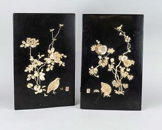 Pair of ornamental plaques, Japan, 1st half of 20th c., wood overlaid with black lacquer and mother-of-pearl and bone inlays depicting quails in the g