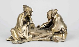 Xiangqi player, China, Republic period(1912-1949), white metal in figural form of two sages playing at a stone table, l 22cm
