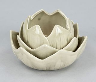 Seladon lotus candle holder, China, Republic period(1912-1949), porcelain in the form of interlaced lotus flower circles with light olive green monoch