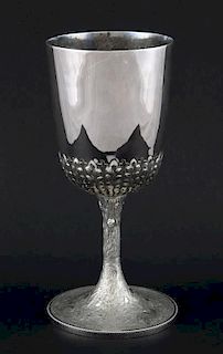 A small quantity of silver plate to include two covered entree dishes, a chalice cup with leaf capped lower decoration, and a