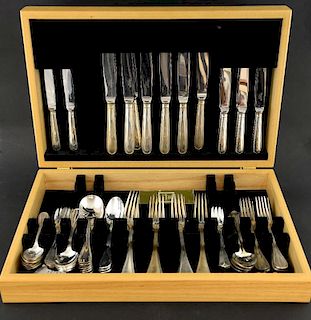 Modern old English pattern canteen of cutlery in light wood case