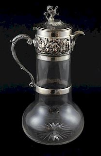 Cut glass claret jug with silver plated mounts