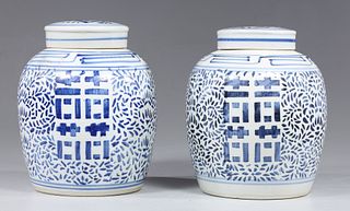 Pair Chinese Blue on White Covered Urns
