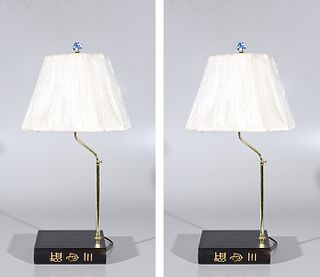 Two Chinese Lamps Mounted on Wood Books