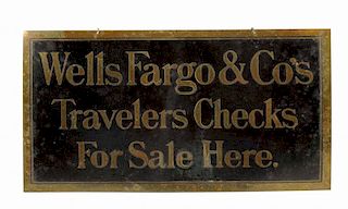 Wells Fargo Travelers Checks Brass Sign.