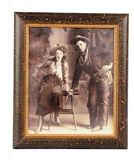 Framed Cowboy & Cowgirl Photograph.