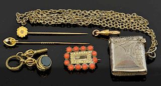 Coral and pearl mourning brooch, two stick pins, and a silver vesta case.