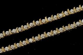 Two diamond set bracelets both with illusion set diamonds in white gold with yellow gold bars spacers mounted in 9 ct gold.