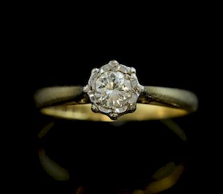 Single stone diamond ring, round brilliant cut diamond weighing approximately 0.30 carats, in an illusion setting mounted in 