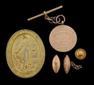 The Confectioners bakers  and allied trades exhibition oval medallion in 9 ct gold, awarded to C Ivor Male, C 1930 and anothe
