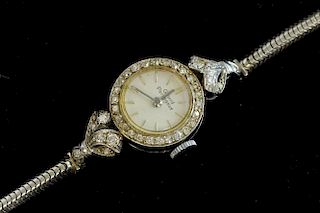 Lady's Girard Perregaux diamond set cocktail platinum watch on  9 ct white gold bracelet.