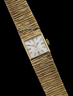 Omega lady's 9 ct gold bracelet watch, square dial,