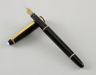 A Mont Blanc Meisterstuck fountain pen. Black resin body and gold plated trim. 14k gold nib