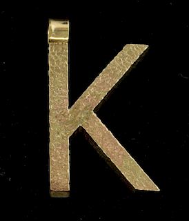 Gold letter K, pendant with textured finish, tested as 9 ct gold
