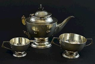 Edward VII silver bachelor's three piece tea service, comprising teapot, cream jug and sugar bowl, by Charles Boyton & Son Lt