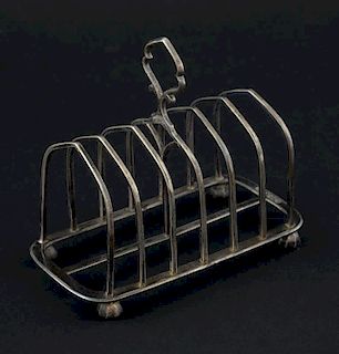 Victorian silver six division toast rack with loop handle on shaped feet, by Edward Gilbert, London, 1884, 7.6oz, 236g,