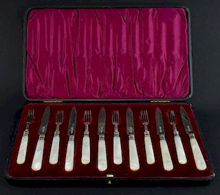 Set of six Edward VII silver and mother of pearl handled fruit knives and forks, by Atkin Brothers, Sheffield, 1901, in fitte