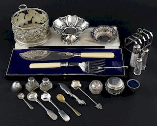 George V silver bon bon dish on foot, by Mappin & Webb, London, 1924, a five bar silver toast rack, an embossed silver bon bo