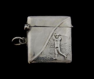 Silver vesta case with golfer design,