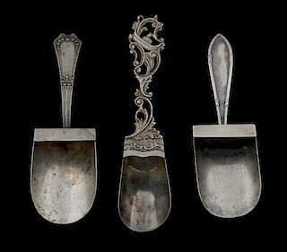 Three silver '800' standard caddy spoons, one Italian with a  pierced design handle with a Gondola,