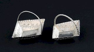 Pair of continental silver dishes in the form of baskets, import marks for London, 1896,