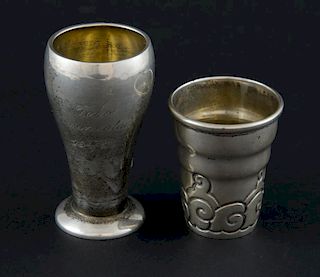 Two silver beakers one Swedish and one Danish, different designs,