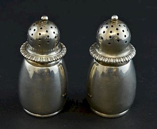 Pair of Tiffany & Co. sterling silver pepperettes, impressed registration numbers and marks to bases, total weight 71.2g/ 2.2