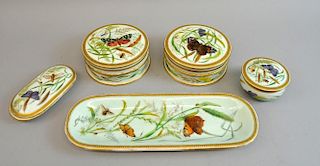 A five piece dressing table set decorated with hand painted butterflies and insects within a gilt border.